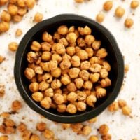 roasted chickpeas in a black wooden bowl