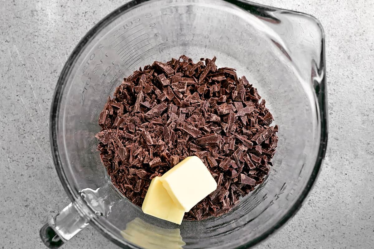 chopped chocolate in a mixing bowl with butter