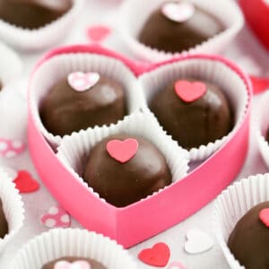 chocolate truffles in a pink heart shaped box