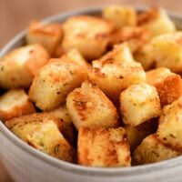 a bowl filled with croutons