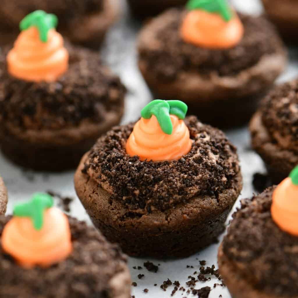 carrot patch cookie cups on a piece of parchment paper