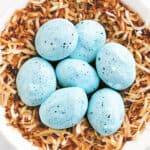 robins egg meringue cookies and a coconut nest in a bowl