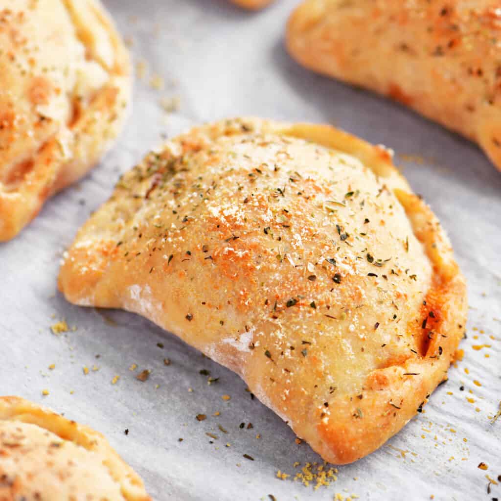 calzones with spices on top