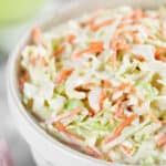 coleslaw in a white bowl