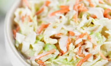 coleslaw in a white bowl