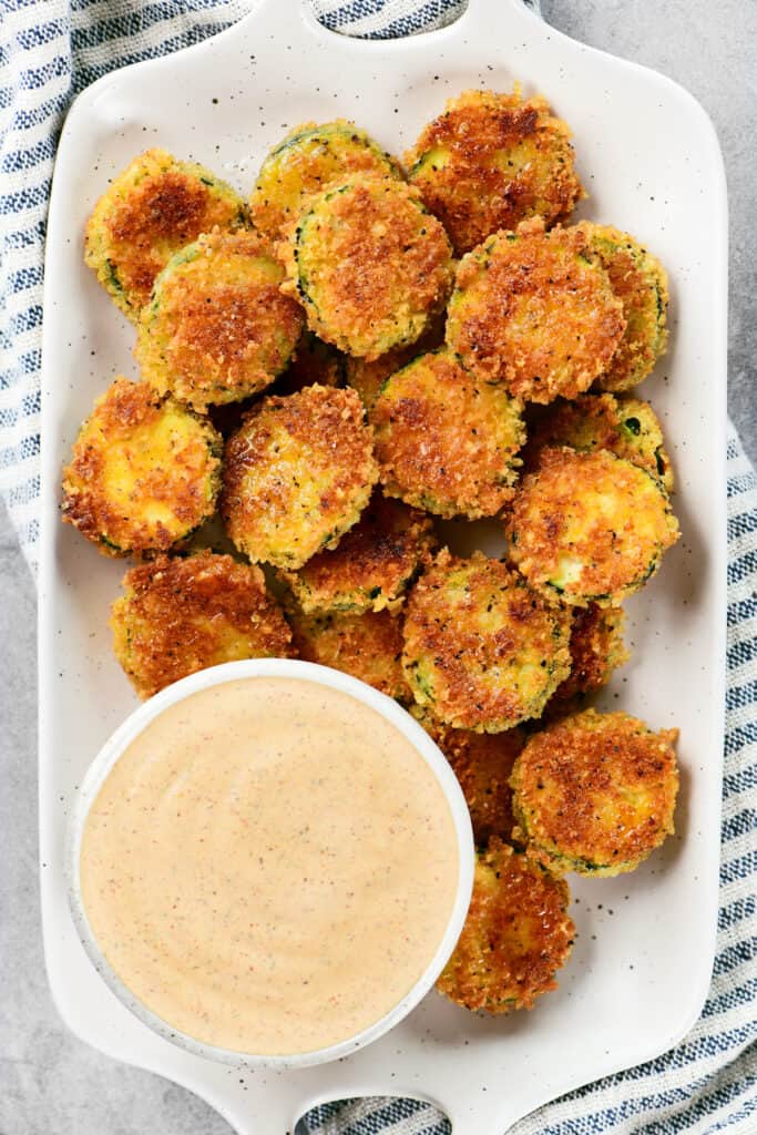 a serving of fried zucchini bites on a platter