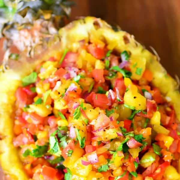 pineapple salsa in a pineapple bowl
