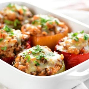 a casserole dish with stuffed peppers inside.