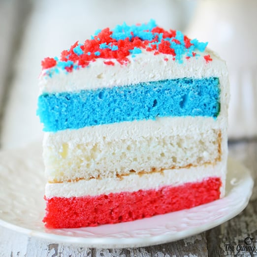 slice of red, white, and blue cake on a white plate.