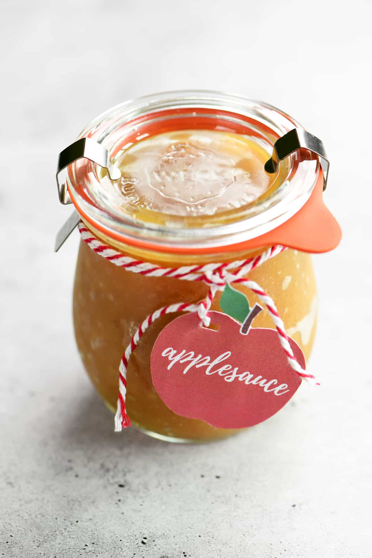 a labeled mason jar with applesauce.