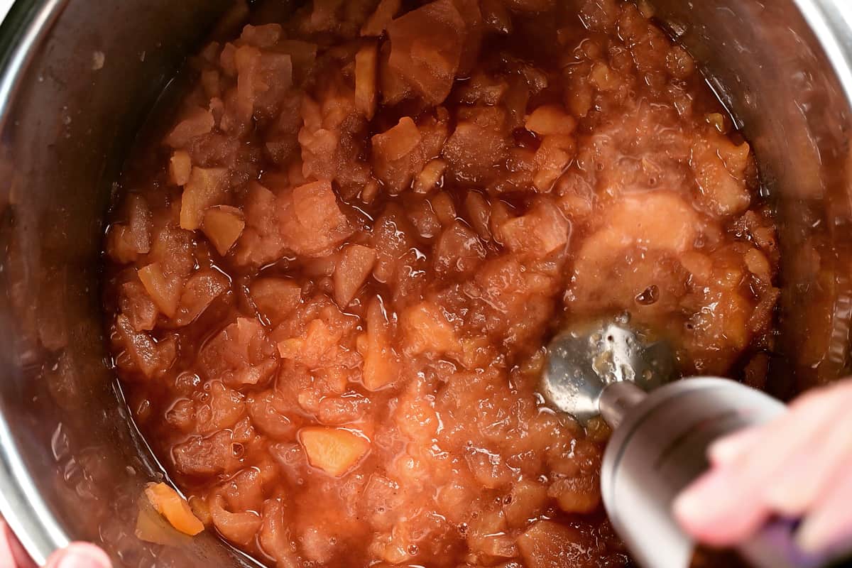 using an stick blender to mash applesauce in an instant pot.