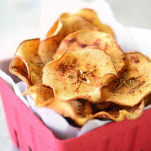 apple chips in a red berry basket.