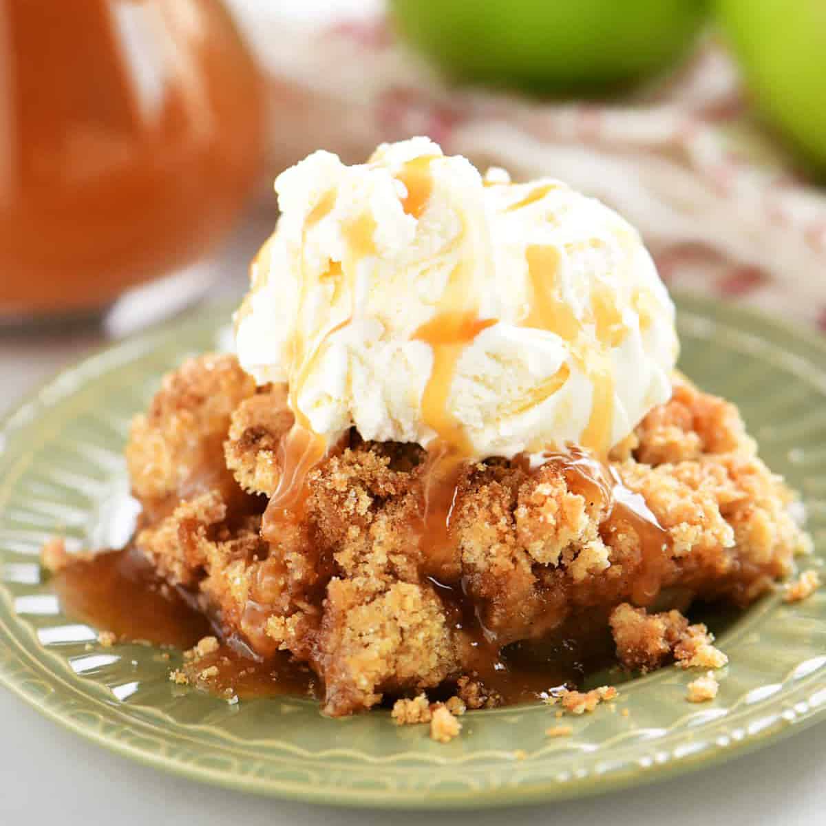apple crumble with ice cream on top.