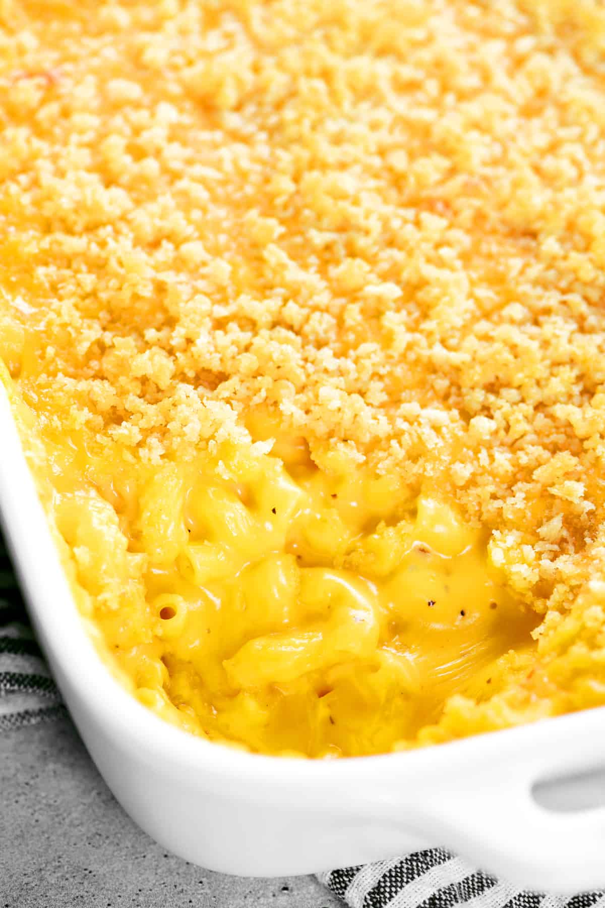 baked mac and cheese in a white casserole dish.