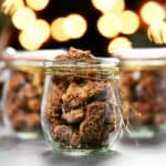 candied pecans in mason jars with gold string