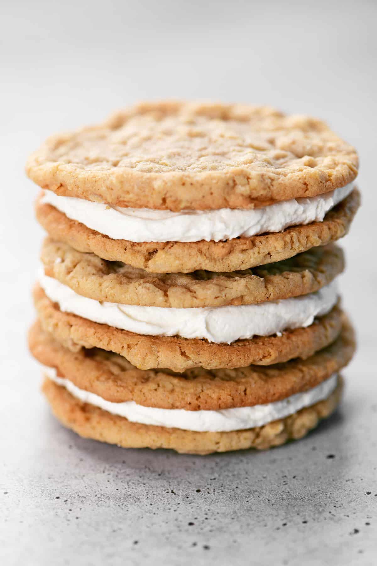 A stack of three oatmeal cream pies.