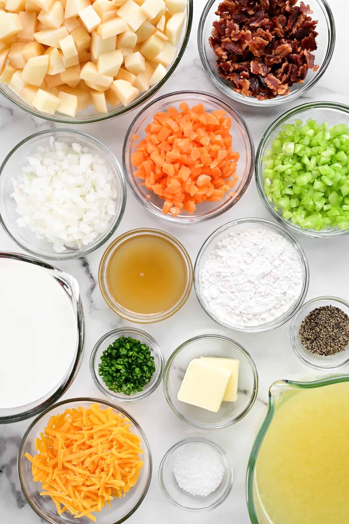 ingredients laid out in bowls on a countertop.