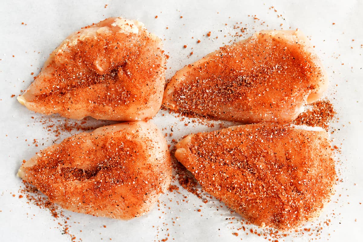 four chicken breast coated with a savory dry rub.