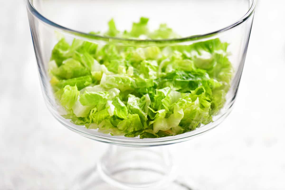 lettuce in a glass trifle dish.
