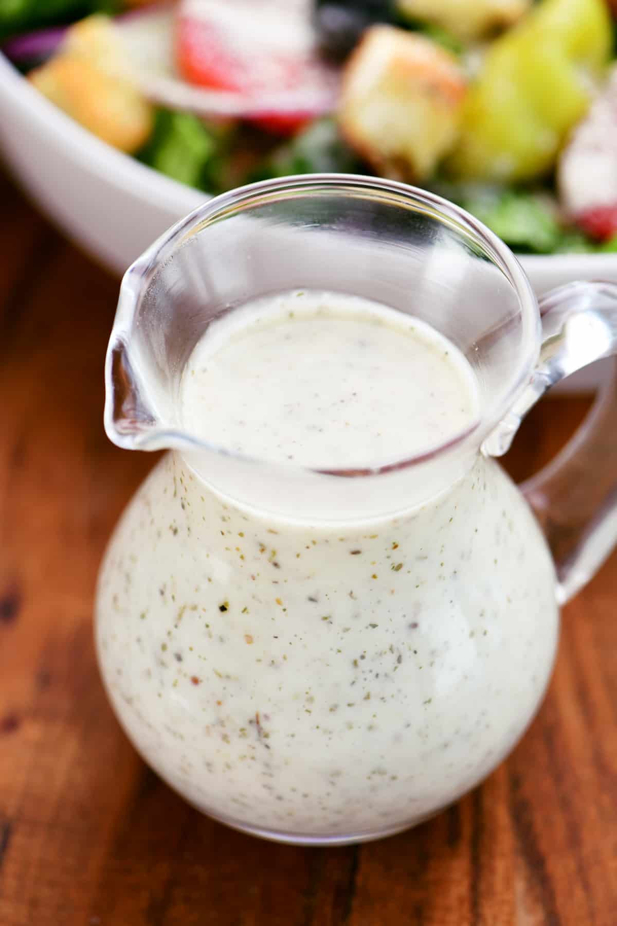 homemade Italian dressing in a pitcher.