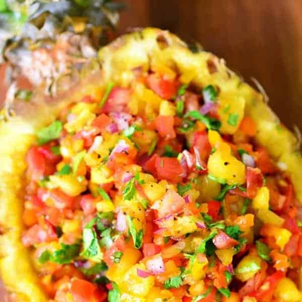 pineapple salsa in a pineapple bowl.