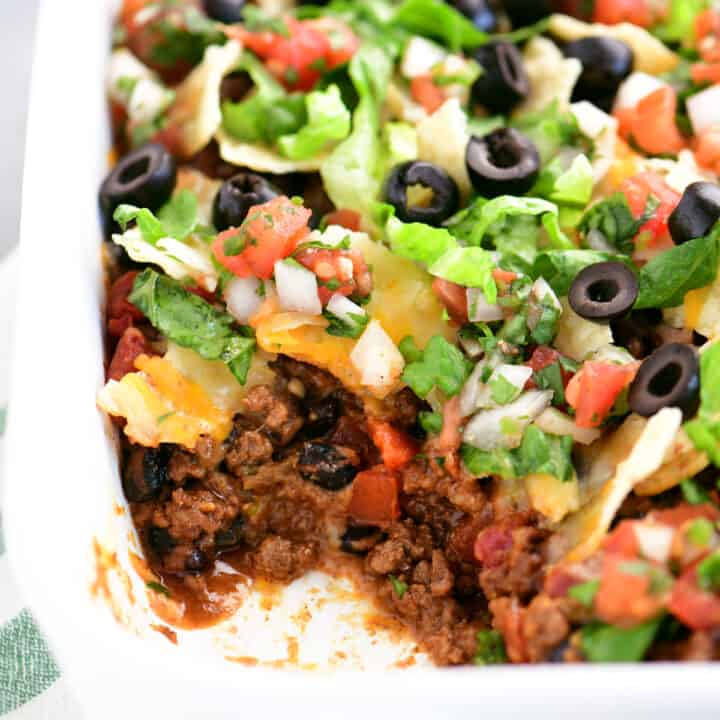 taco casserole with a scoop removed.