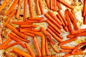 Roasted carrots on a pan.
