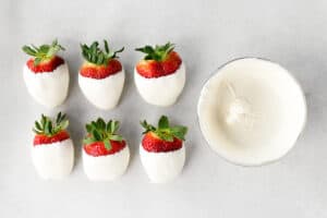 strawberries dipped in white candy wafers.