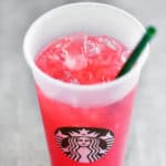 Starbucks passion tea drink in a Starbucks branded cup.