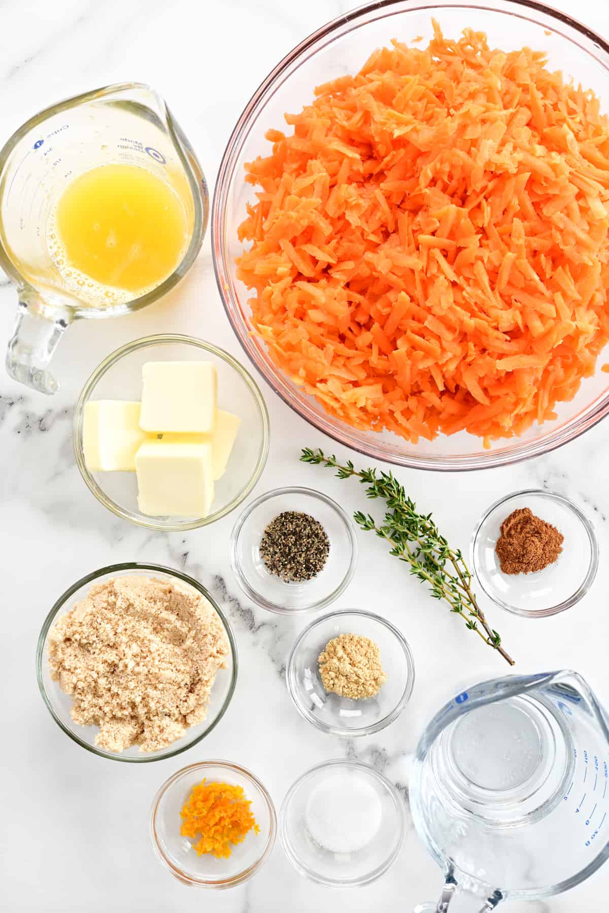 Ingredients for shredded glazed carrots.
