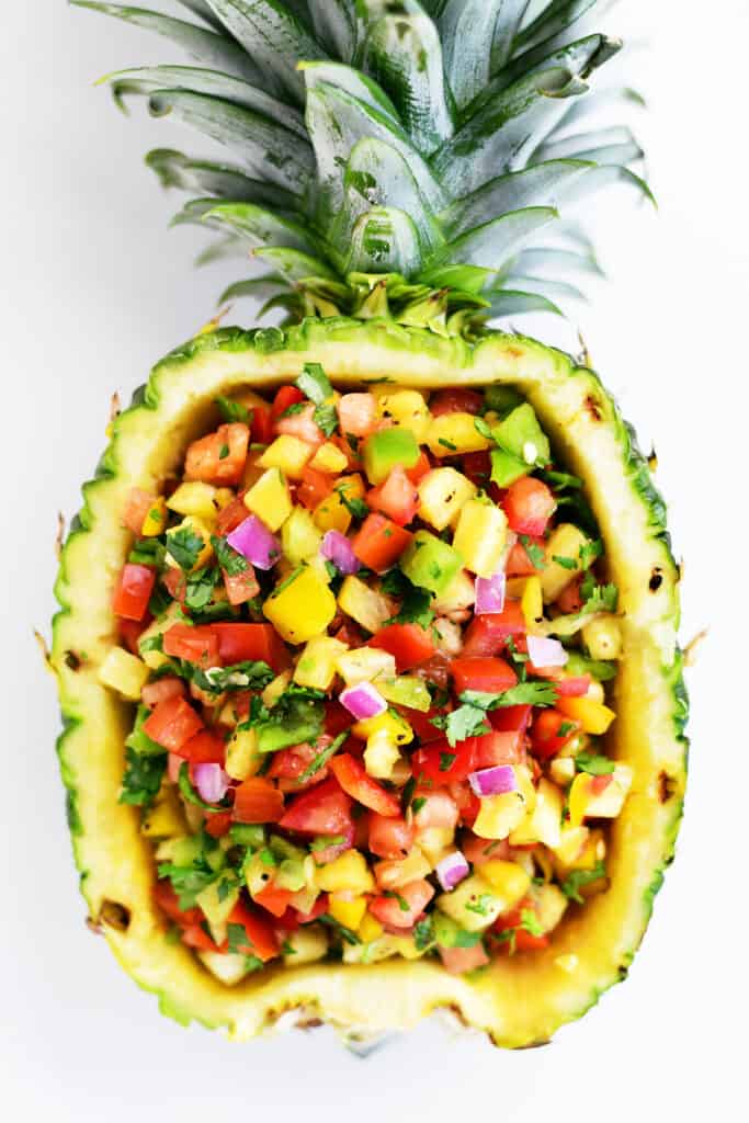 Pineapple salsa in a pineapple bowl.