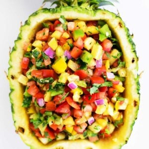 Pineapple salsa in a hallowed-out pineapple bowl.