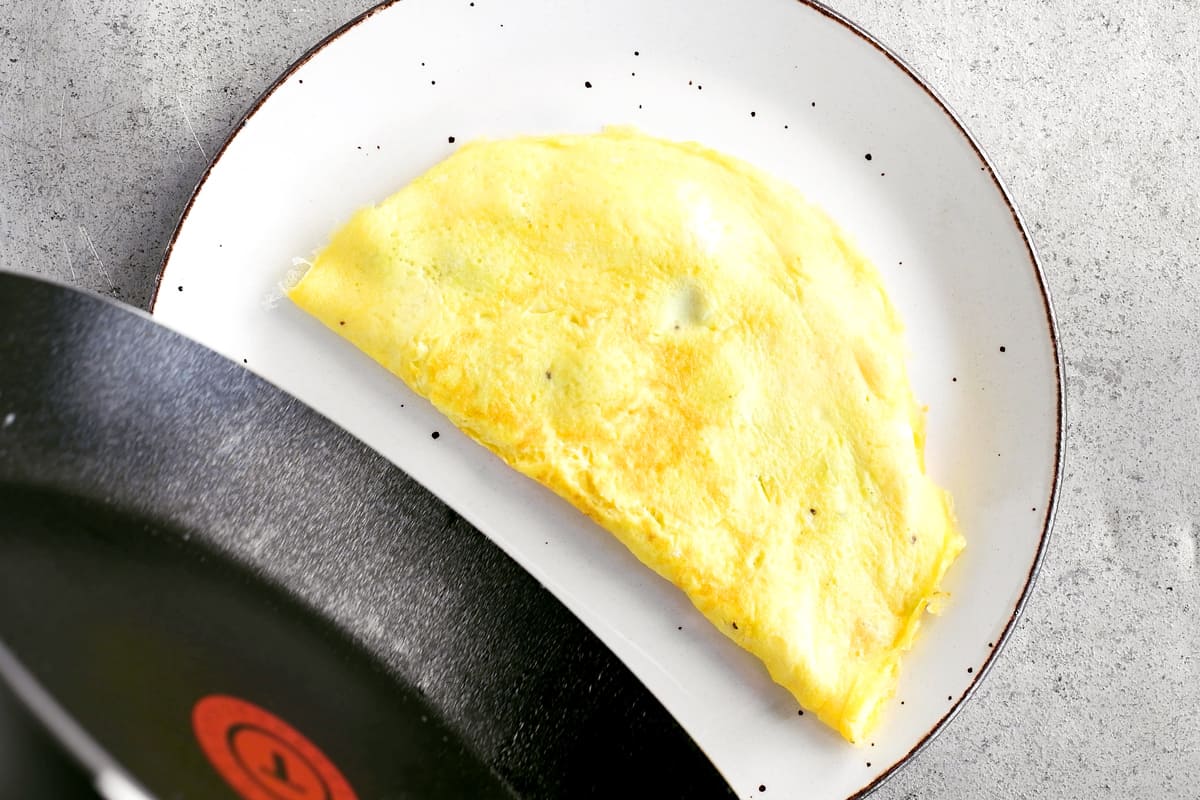 Plating an omelette.