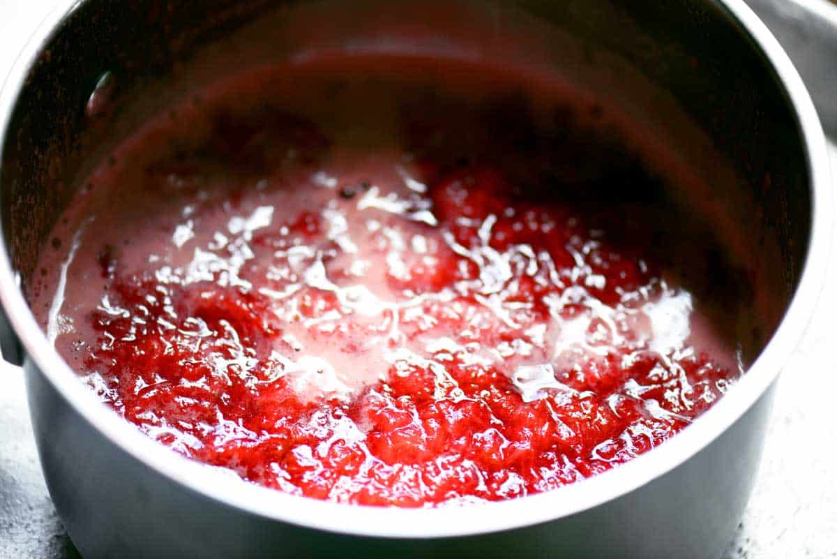 Strawberry glaze in a sauce pan.