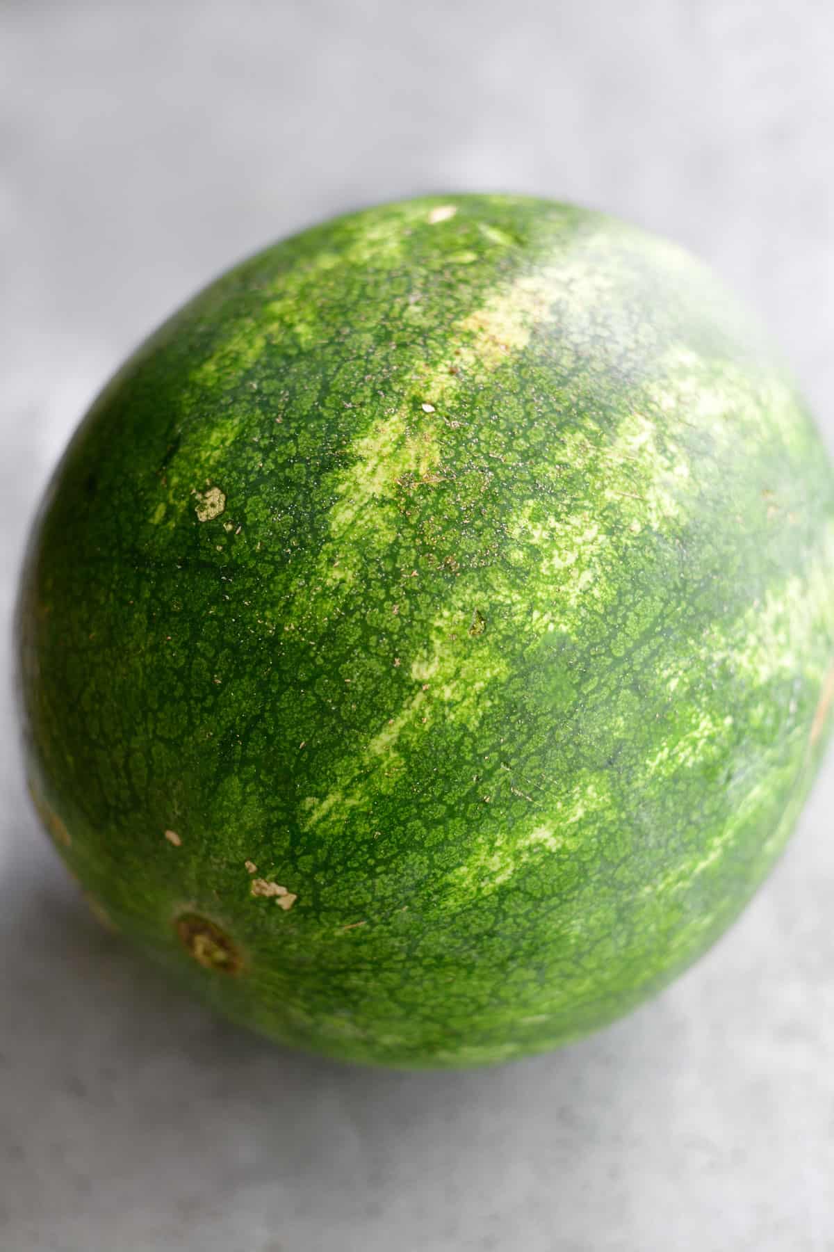 A whole ripe watermelon.