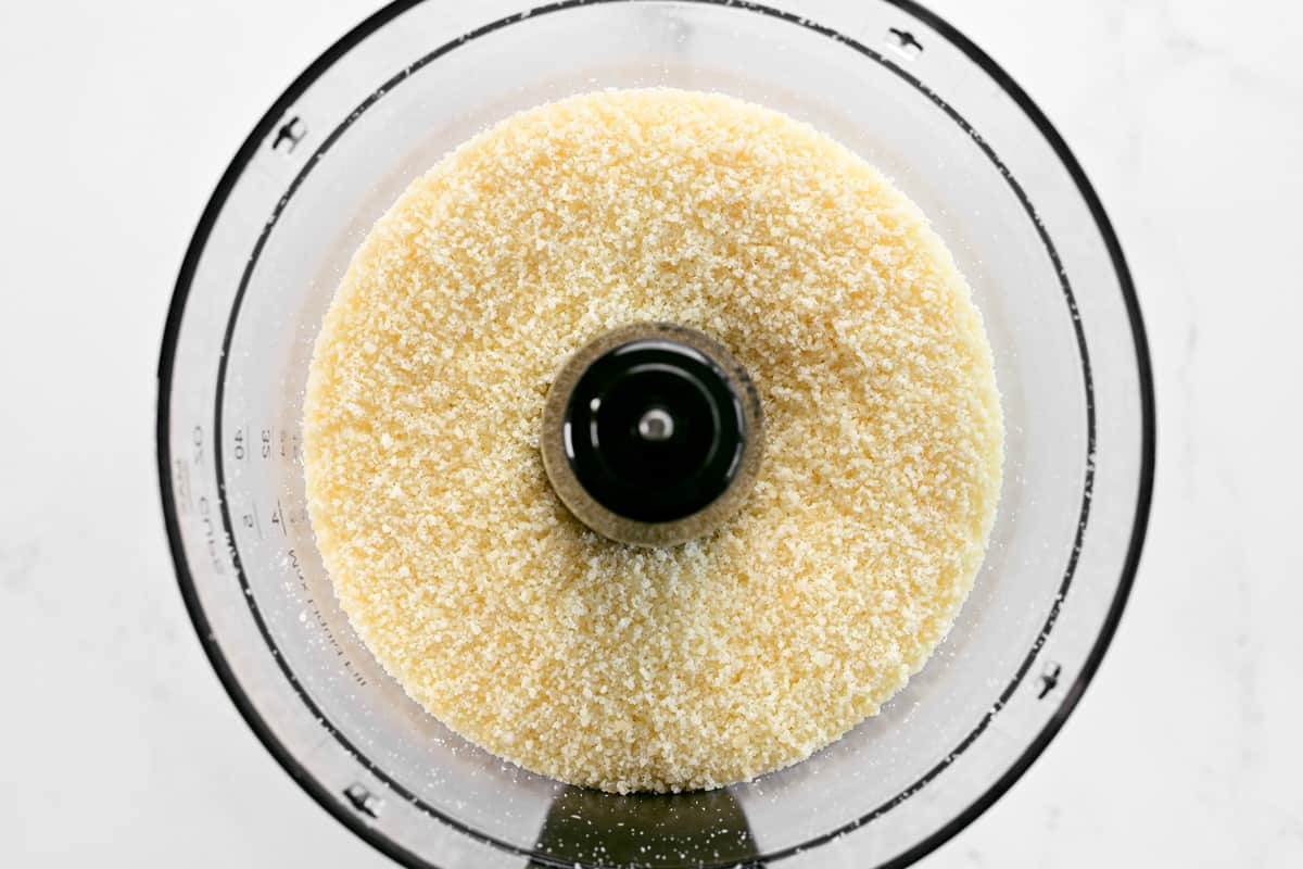 Grated parmesan cheese in a food processor.