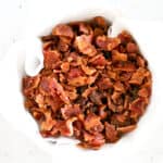 A bowl full of bacon bits.