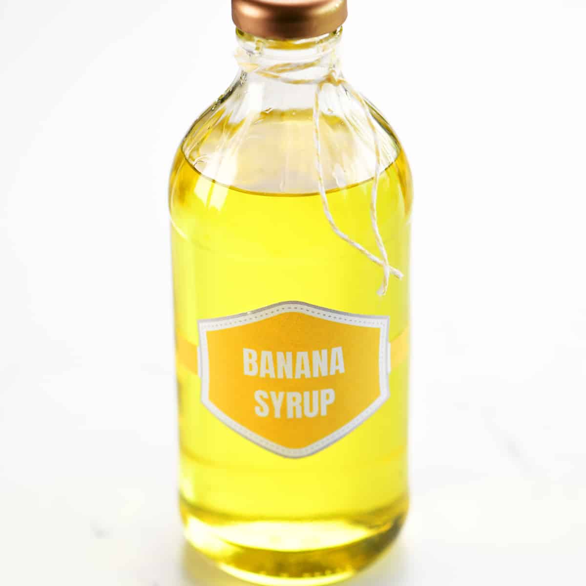 Banana syrup in a glass bottle.