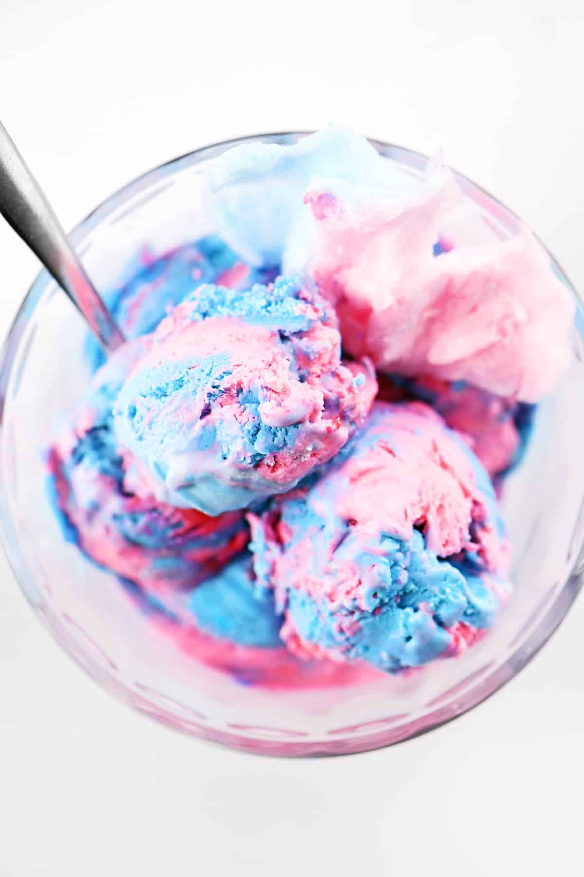 Cotton candy ice cream in a glass dish.