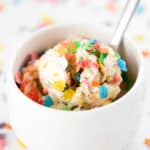 A close up view of Fruity Pebbles ice cream in a bowl.