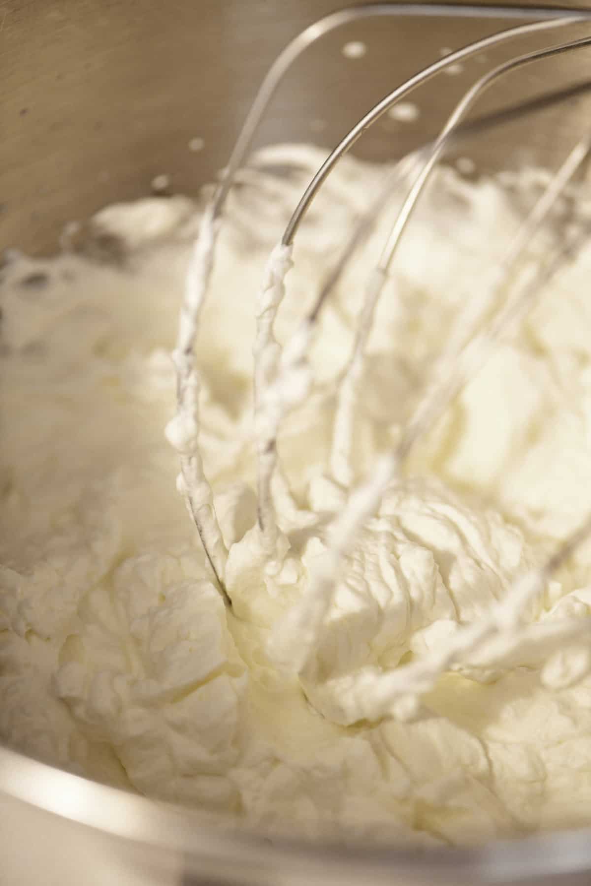 Whipped cream in bowl.