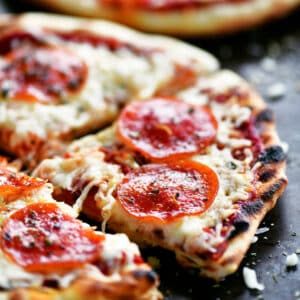 Grilled pizza with pepperoni.
