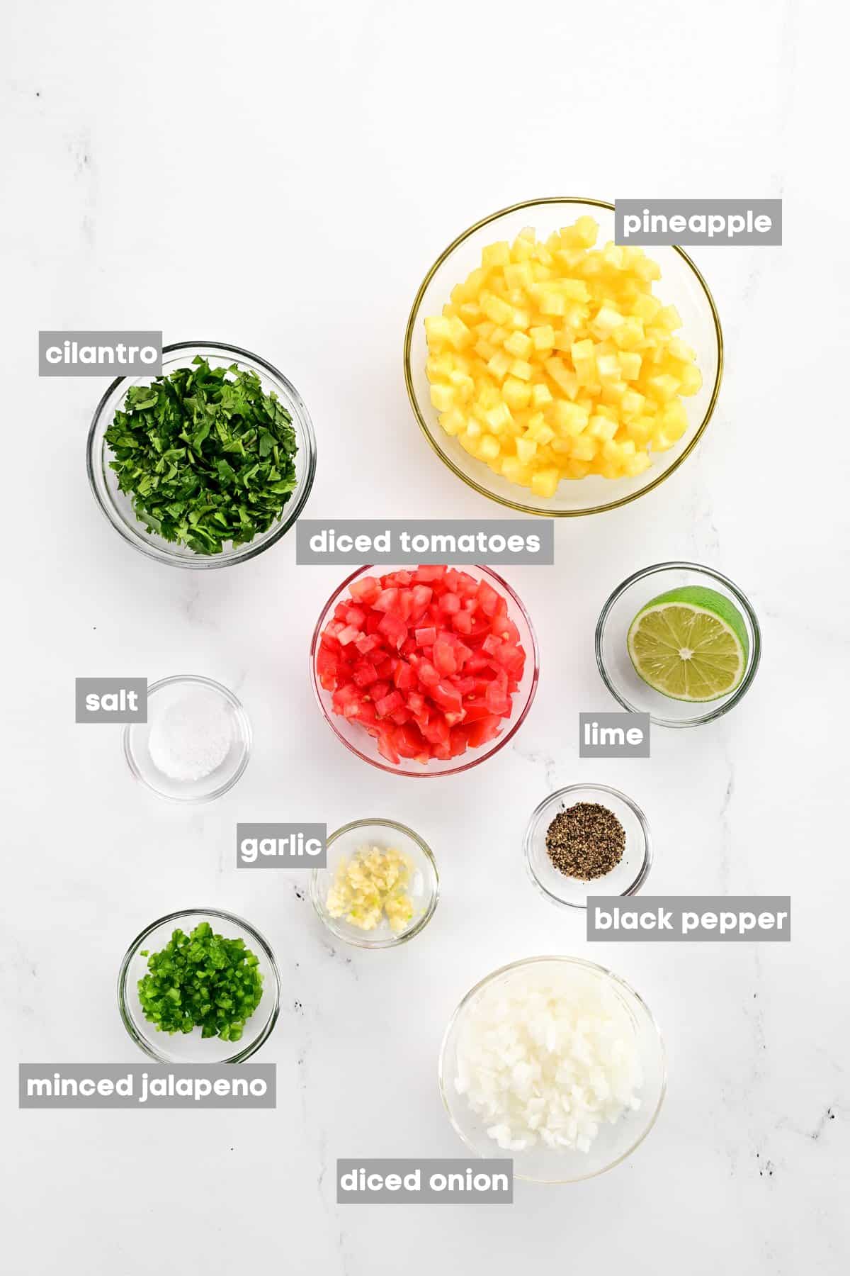 Labeled ingredients in bowls.
