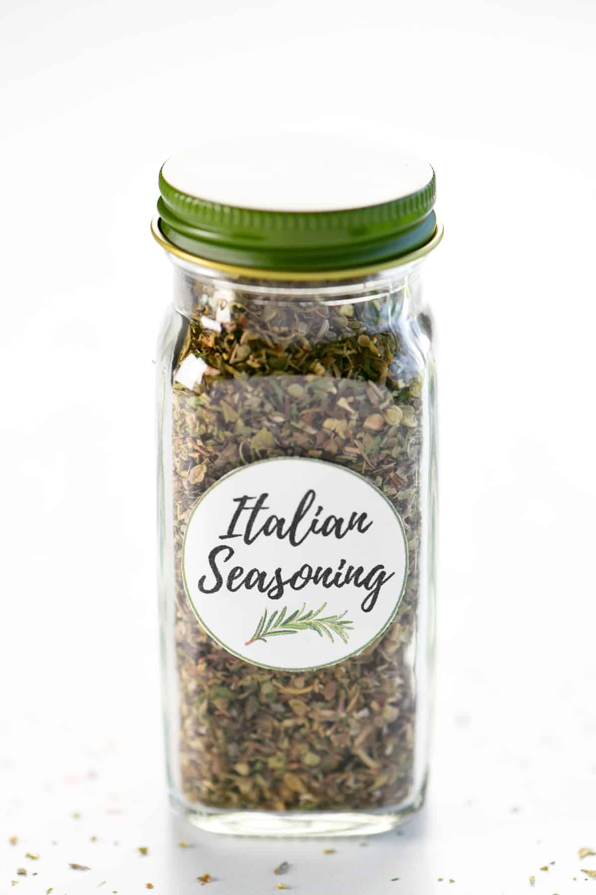 An Italian Seasoning Substitute spice mix in a glass spice jar with a label.