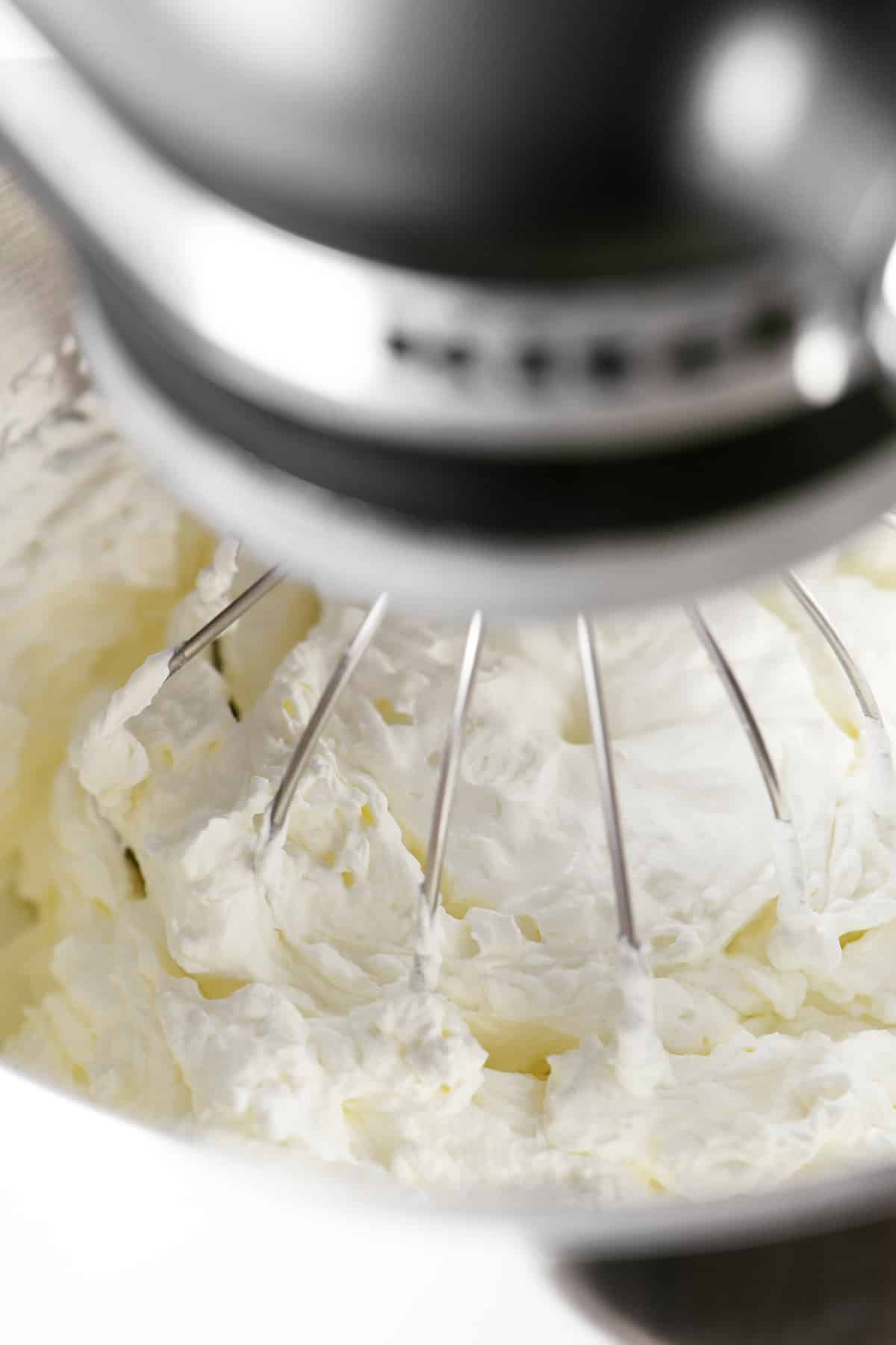 Whipped cream in a mixer.