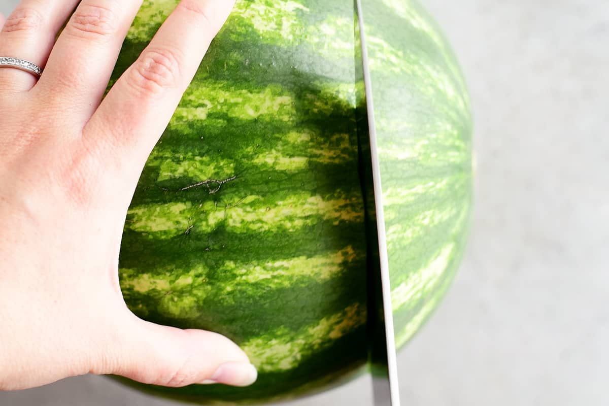 Slicing a watermelon.