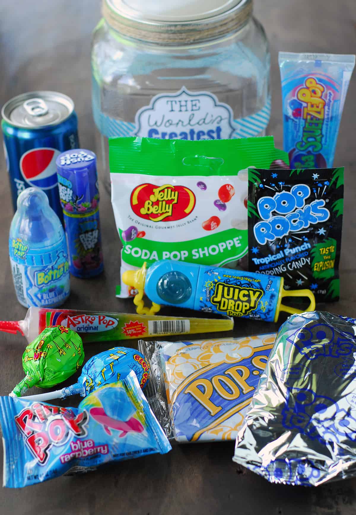 Candy, food, and beverages with a blue and pop theme.