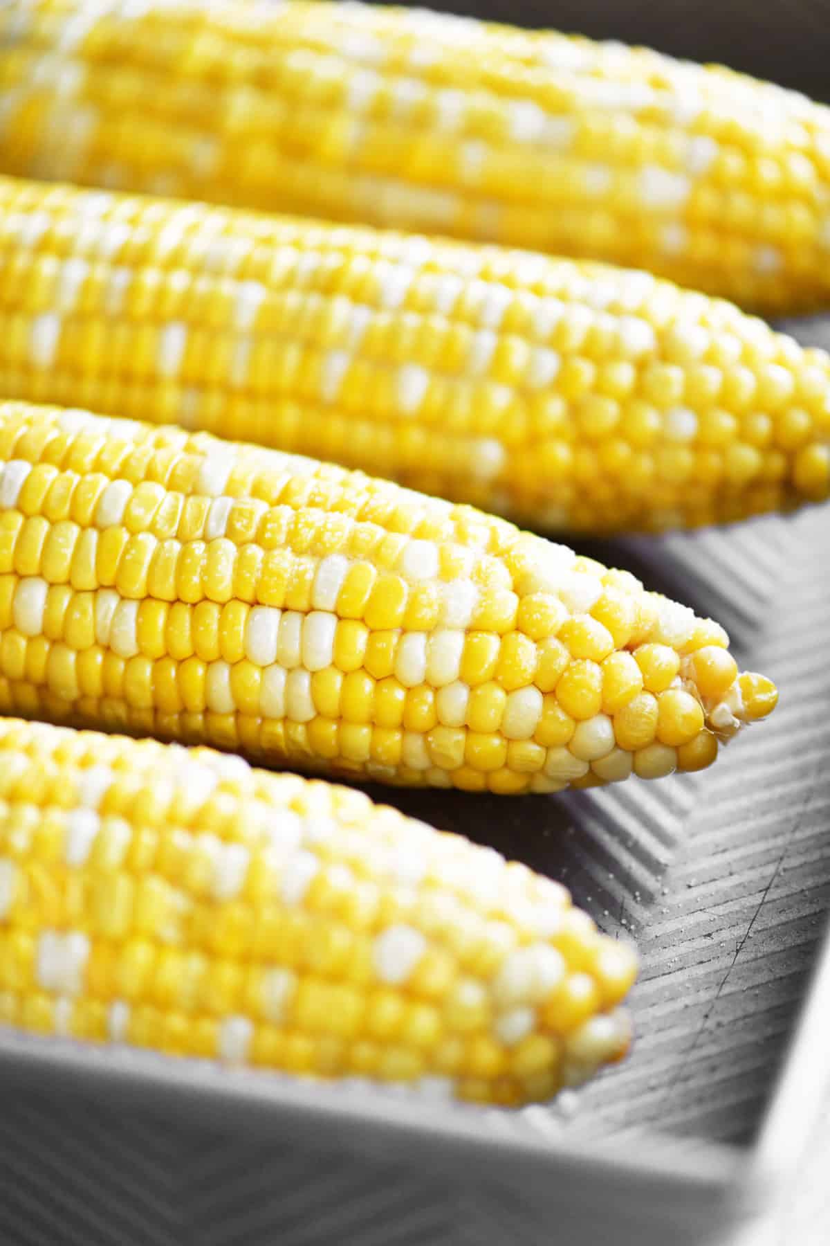 Corn on the cob baked in the oven.