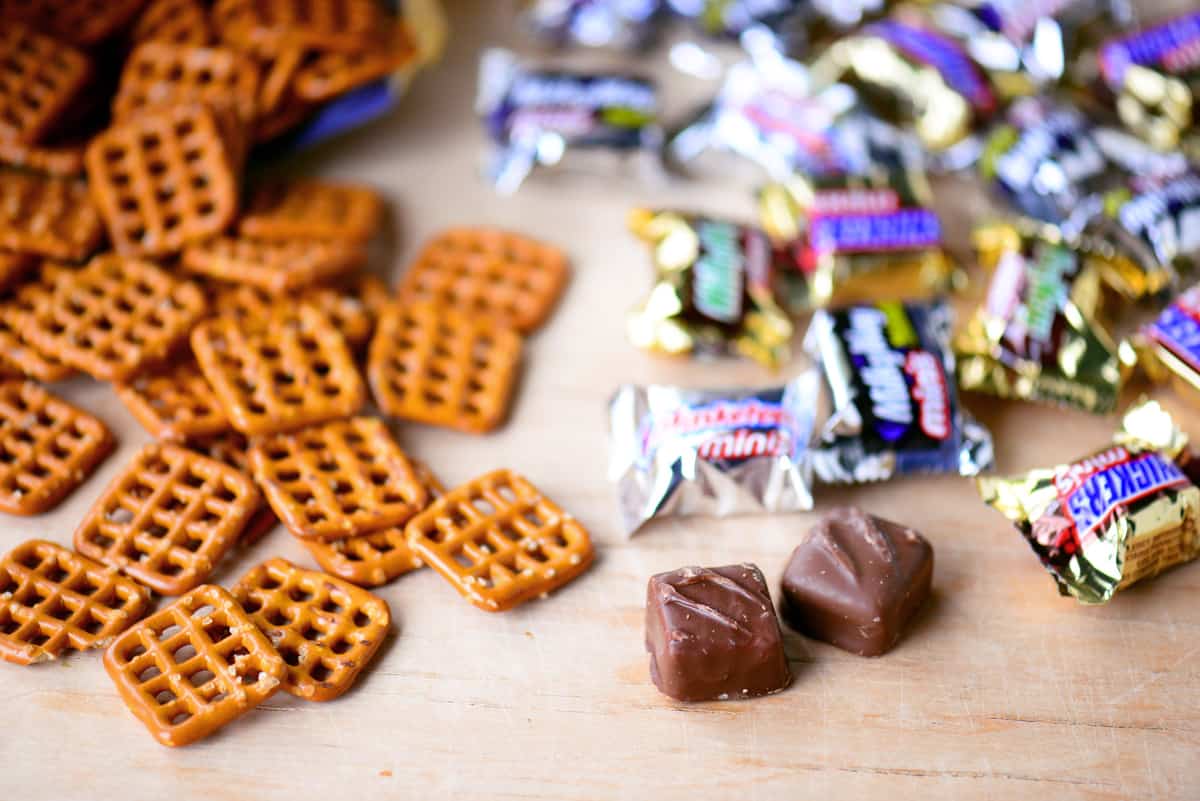 Square pretzels and mini candy bars.