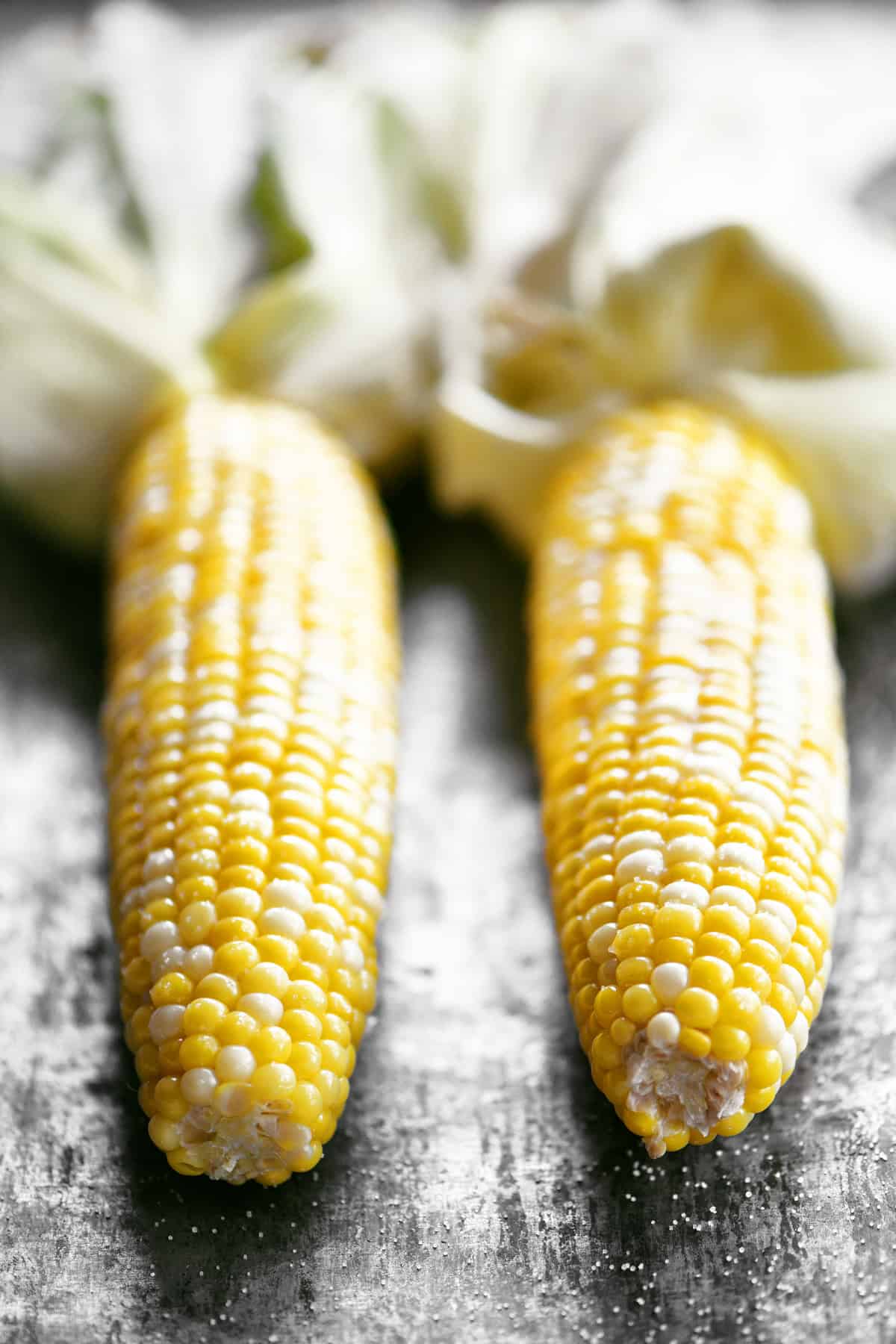 Cooked microwave corn on the cob.